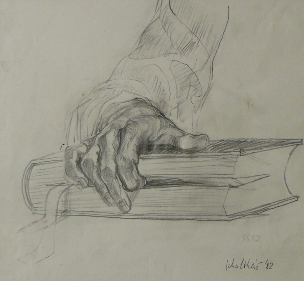 Bild Volker Schultheis | Hand am Buch